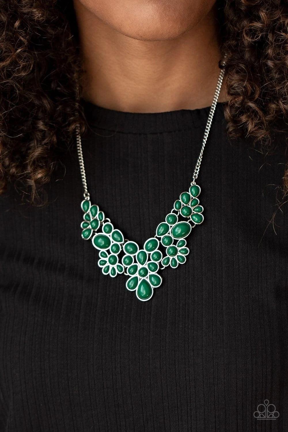 Paparazzi Accessories Bohemian Banquet - Green Featuring round, teardrop, and oval shapes, a shiny collection of dainty Ultramarine Green beads delicately link into bubbly silver frames, creating a whimsical pop of color below the collar. Features an adju