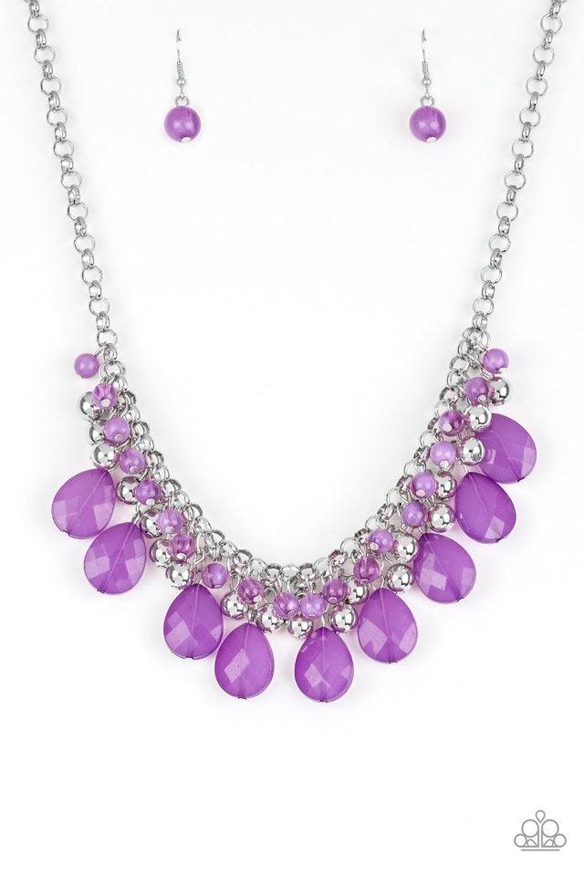 Paparazzi Accessories Trending Tropicana ~Purple A row of cloudy purple beads gives way to a row of shiny silver beads. Brushed in an opalescent finish, purple teardrops cascade from the bottom of bold interlocking silver chains, creating a dramatically c