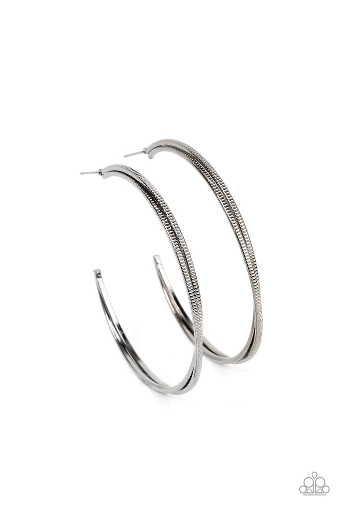 Paparazzi Accessories Monochromatic Curves - Black Etched in ribbed texture, two glistening silver bars gently curve and stack into an oversized hoop for a classic metallic look. Earring attaches to a standard post fitting. Hoop measures approximately 2"