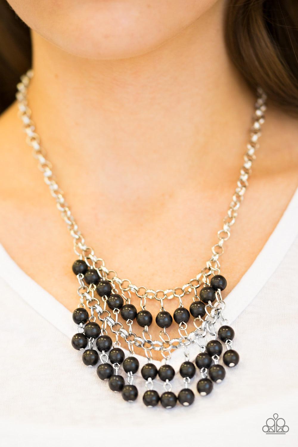 Paparazzi Accessories Jurassic Park Party - Black Earthy black stone beads swing from the bottom of a netted silver chain, creating a bold artisanal fringe below the collar. Features an adjustable clasp closure. Sold as one individual necklace. Includes o