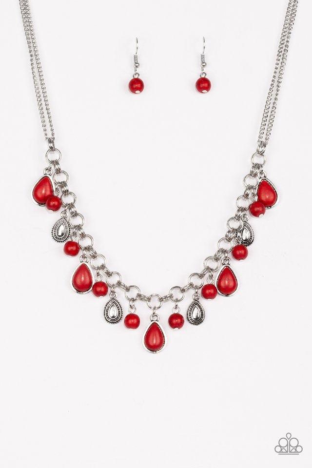 Paparazzi Accessories Welcome To Bedrock ~Red Chiseled into round and teardrop shapes, fiery red stones swing from the bottom of a bold double-linked silver chain below the collar. Embossed in studded details, shimmery silver teardrops drip between the st