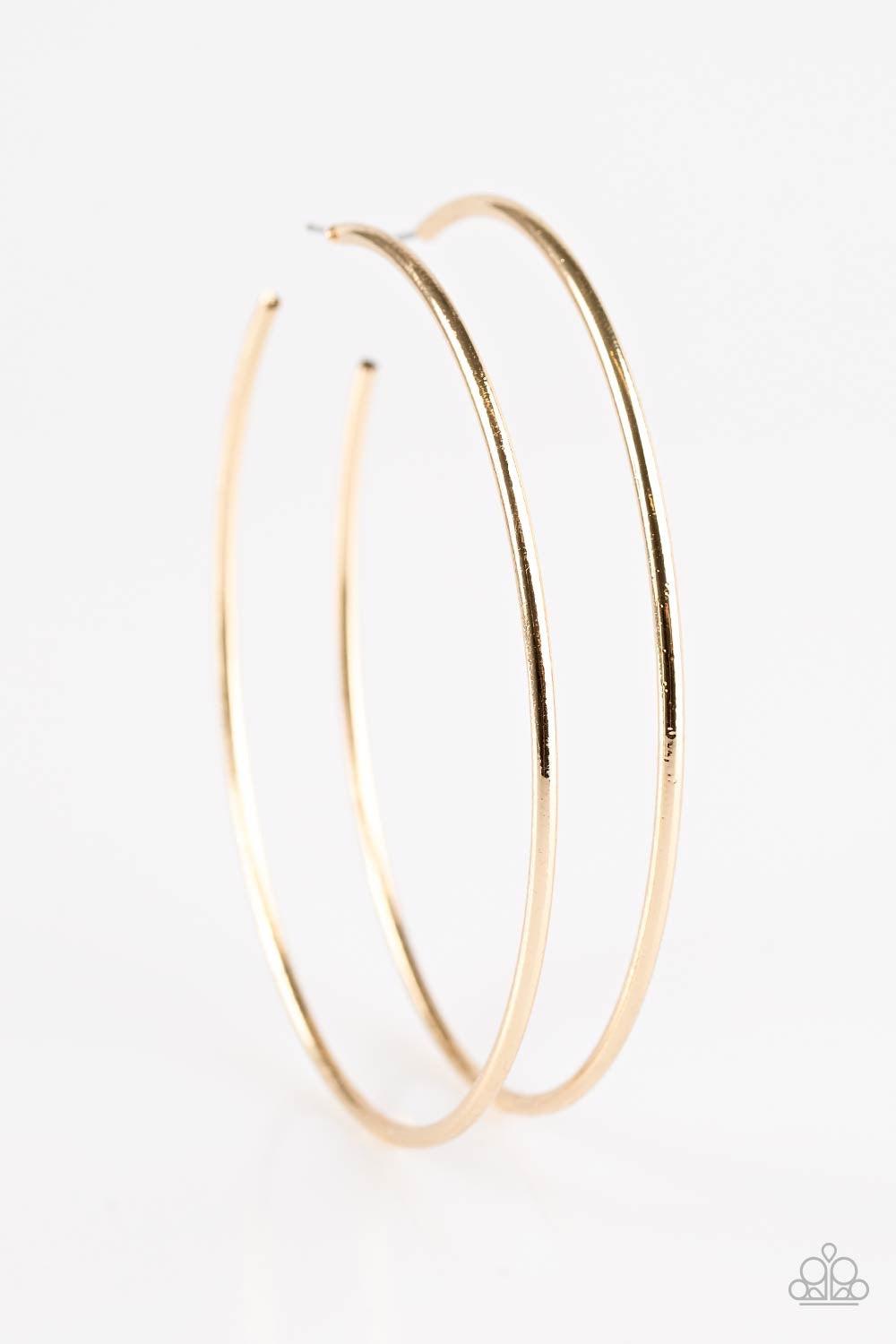 Paparazzi Accessories Meet Your Maker - Gold A skinny ribbon of gold curls into a bold hoop for a dramatic look. Earring attaches to a standard post fitting. Hoop measures 3” in diameter. Jewelry