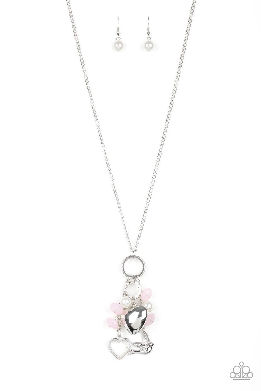 Paparazzi Accessories I Will Fly - Pink A silver bird charm, silver heart charms, and collection of white pearls and opaque pink crystal-like beads swing from the bottom of a lengthened silver chain for a whimsically clustered look. Features an adjustable