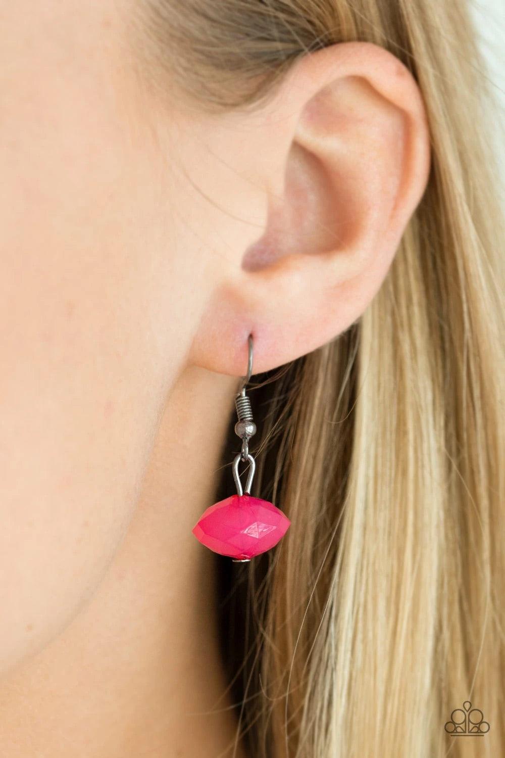 Paparazzi Accessories Runway Rebel - Pink Featuring cloudy and glassy finishes, faceted pink crystal-like beads swing from the bottom of a glistening gunmetal chain. Faceted gunmetal beads join the pink beading, creating a flirtatious fringe below the col