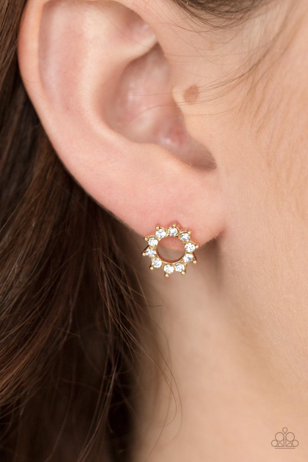 Paparazzi Accessories Richly Resplendent - Gold Glittery white rhinestones are encrusted along a radiating gold frame, creating a resplendent frame. Earring attaches to a standard post fitting. Jewelry