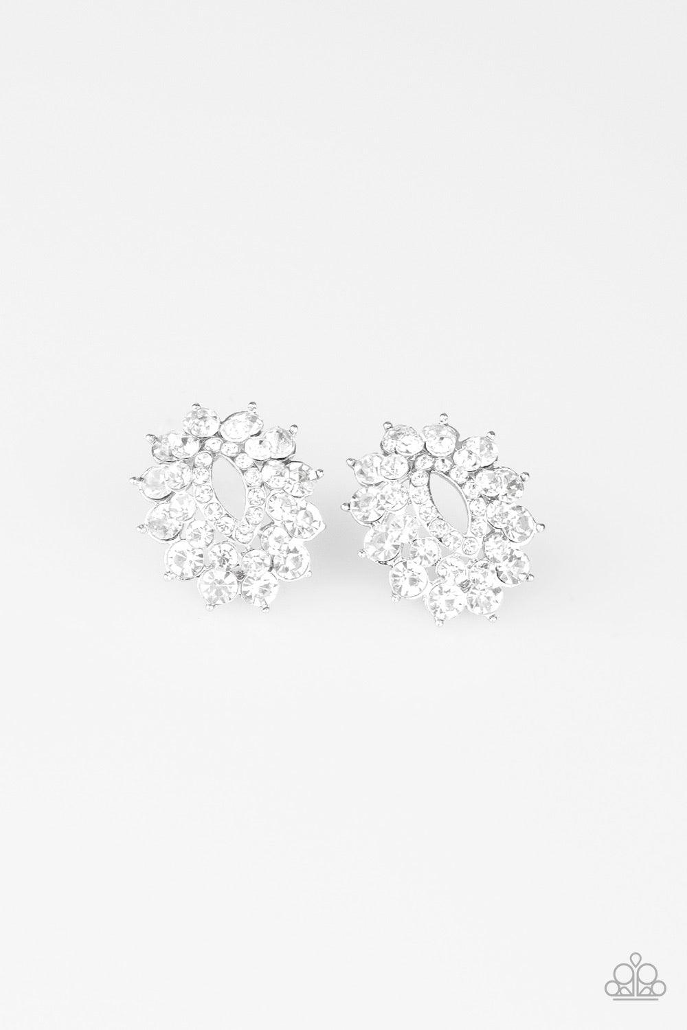 Paparazzi Accessories Brighten The Moment - White Varying in size, three stacks of glittery white rhinestones fan out from an airy center, coalescing into a stellar frame. Earring attaches to a standard post fitting. Jewelry