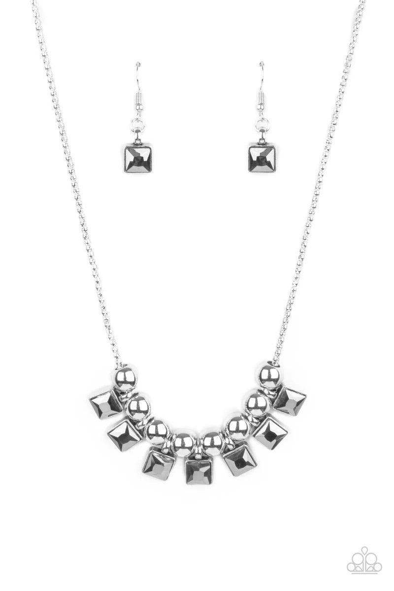 Paparazzi Accessories Graciously Audacious ~Silver Smoky hematite square rhinestone frames and oversized silver beads alternate along a silver popcorn chain, creating a stellar fringe below the collar. Features an adjustable clasp closure. Sold as one ind