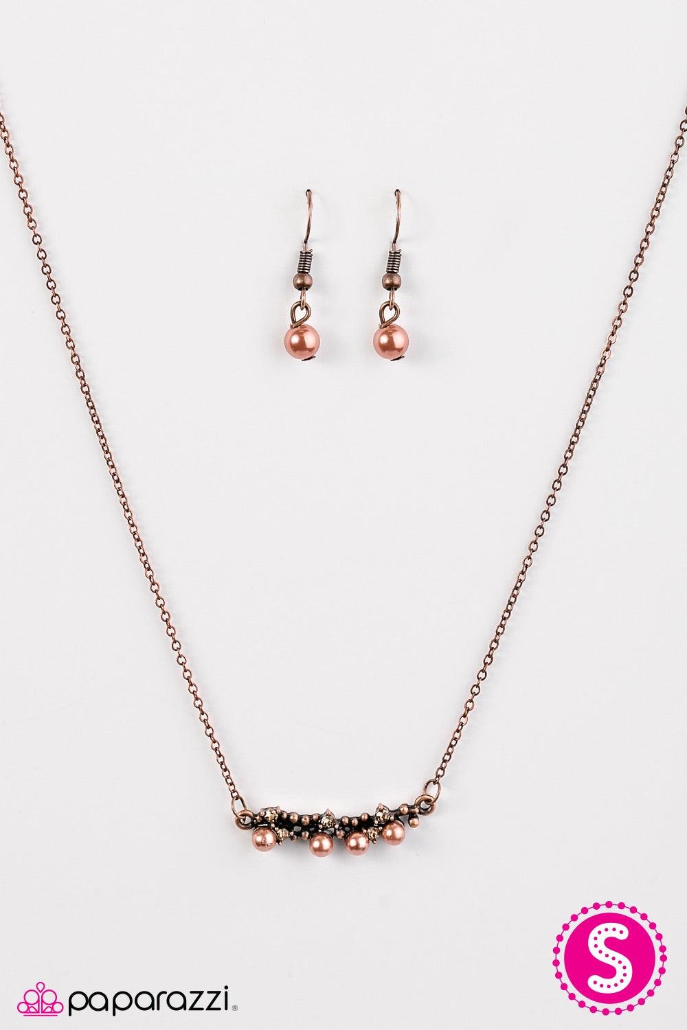 Paparazzi Accessories The Seven Year RICH - Copper Encrusted in golden topaz rhinestones and pearly copper beading, a dainty pendant copper pendant falls just below the collar in a refined fashion. Features an adjustable clasp closure. Jewelry
