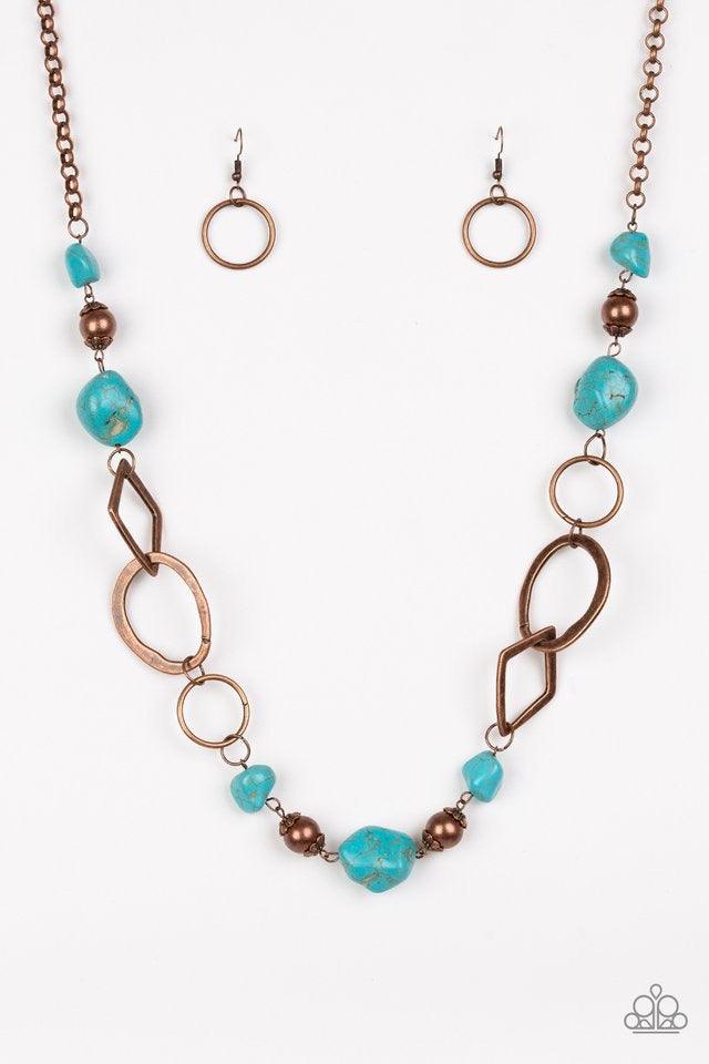 Paparazzi Accessories That’s TERRA-I ficic! - Copper Bits of refreshing turquoise stones and ornate copper beading give way to asymmetrical copper frames. The mismatched frames drape across the chest, creating an earthy collision of rock and metal. Featur