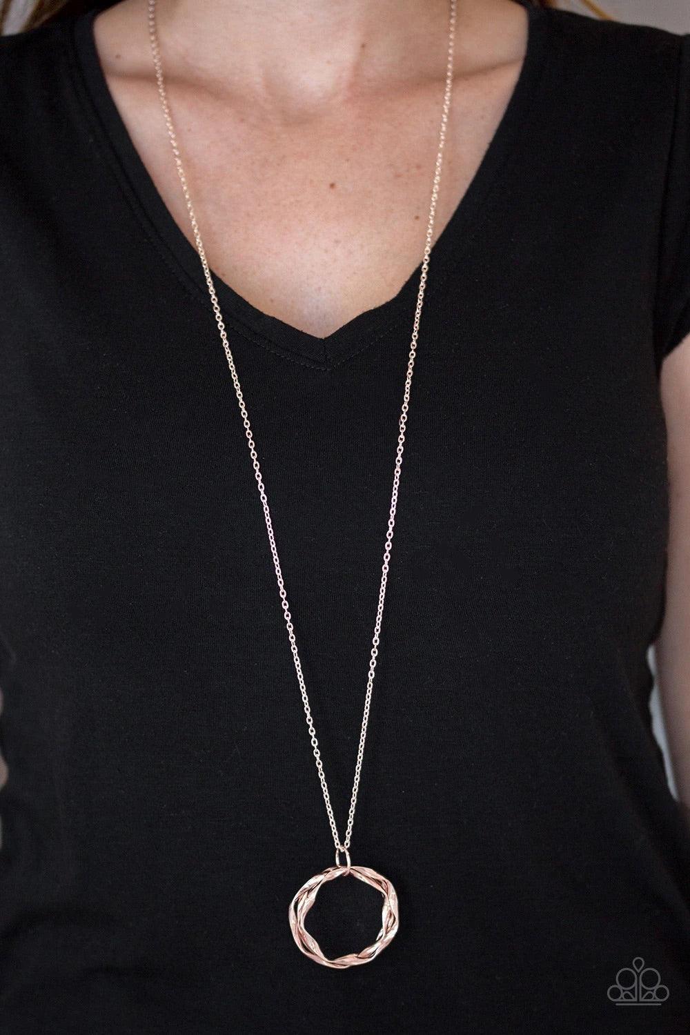 Paparazzi Accessories Millennial Minimalist - Gold Twirling rose gold hoops swing from the bottom of an elegantly elongated rose gold chain, creating a dizzying pendant. Features an adjustable clasp closure. Sold as one individual necklace. Includes one p