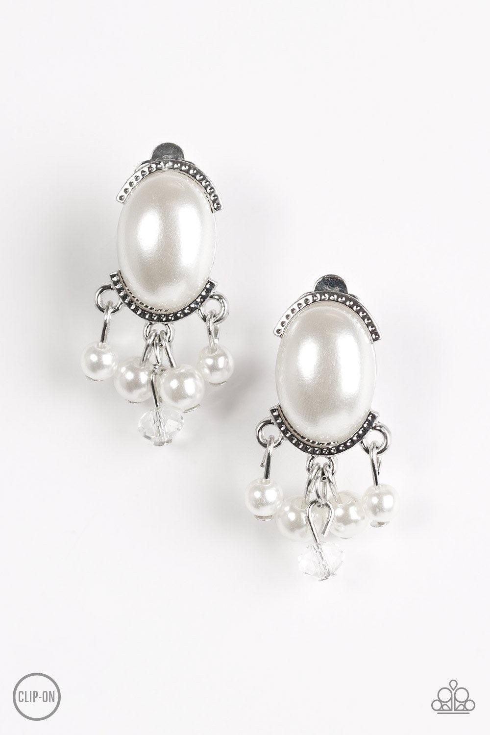 Paparazzi Accessories Classy Casablanca - White *Clip-On Pressed into a sleek silver frame, a pearly white bead gives way to a pearl and crystal-like fringe for a timeless fashion. Earring attaches to standard clip-on fitting. Sold as one pair of clip-on