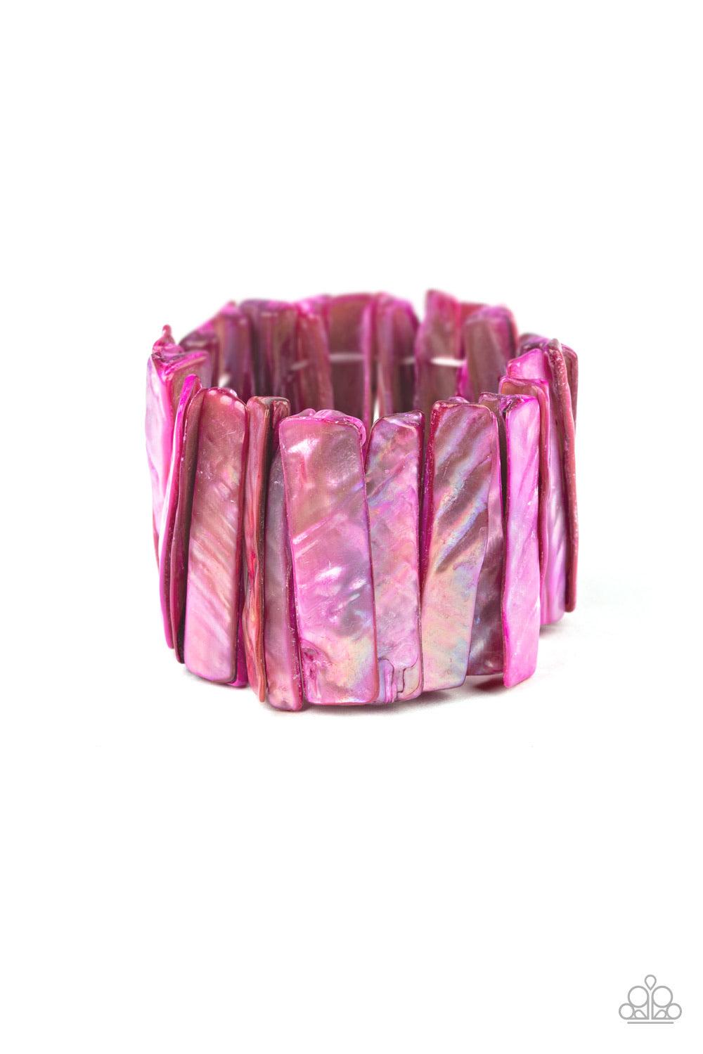Paparazzi Accessories Beach Blast - Pink Brushed in an iridescent shimmer, pink shell-like pieces are threaded along stretchy bands around the wrist for a colorful beach look. Sold as one individual bracel Jewelry