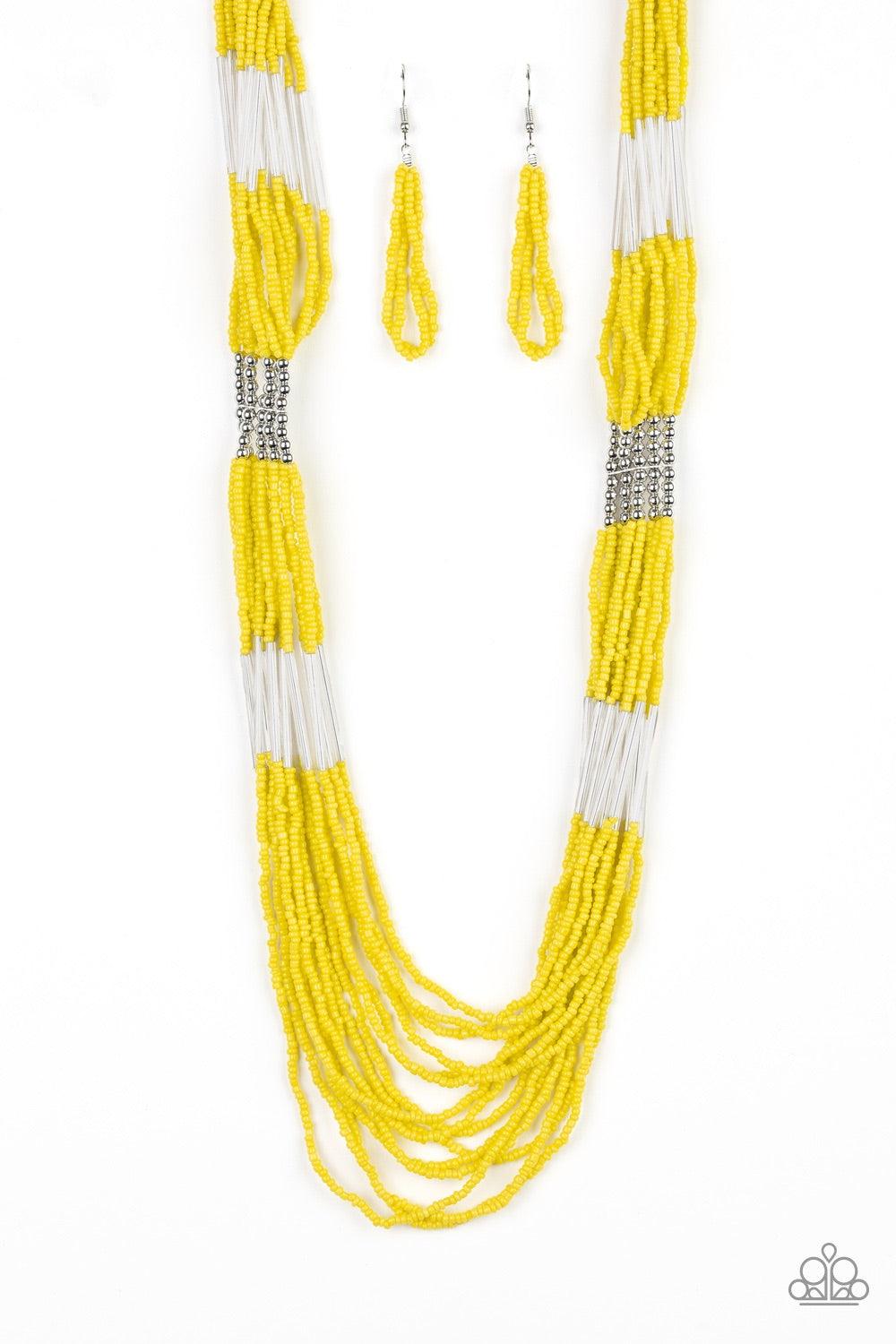 Paparazzi Accessories Let It BEAD - Yellow Countless strands of yellow seed beads drape across the chest in a layered cascade. Accented with classic silver beading, glassy cylindrical beading is added to the display for a radiant finish. Features an adjus