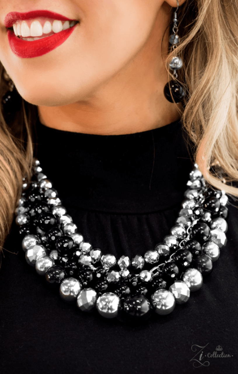 Paparazzi Accessories Fame Featuring polished and shimmery diamond-cut sparkle, row after row of black, silver, and glittery hematite beads join below the collar. Matching beads swing from the centermost strand, adding flirtatious movement to the fierce c