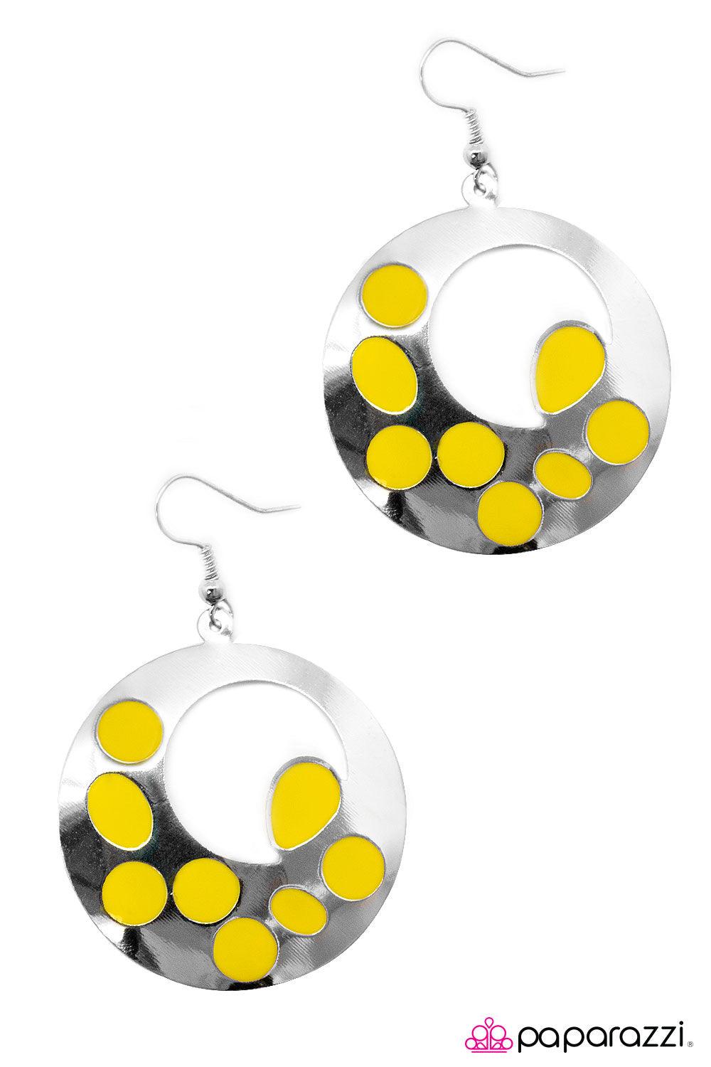 Paparazzi Accessories Pull Yourself Together ~Yellow A sleek silver circle is glazed in a yellow spotted design. Finished in a high-sheen shimmer, the incandescent silver frame and playful splashes of color create a whimsical display. Earring attaches to