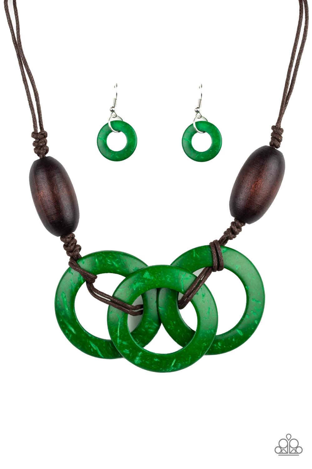 Paparazzi Accessories Bahama Drama - Green Infused with dramatic brown wooden beads, vivacious green wooden hoops are knotted in place below the collar for a summery flair. Features an adjustable sliding knot closure. Jewelry