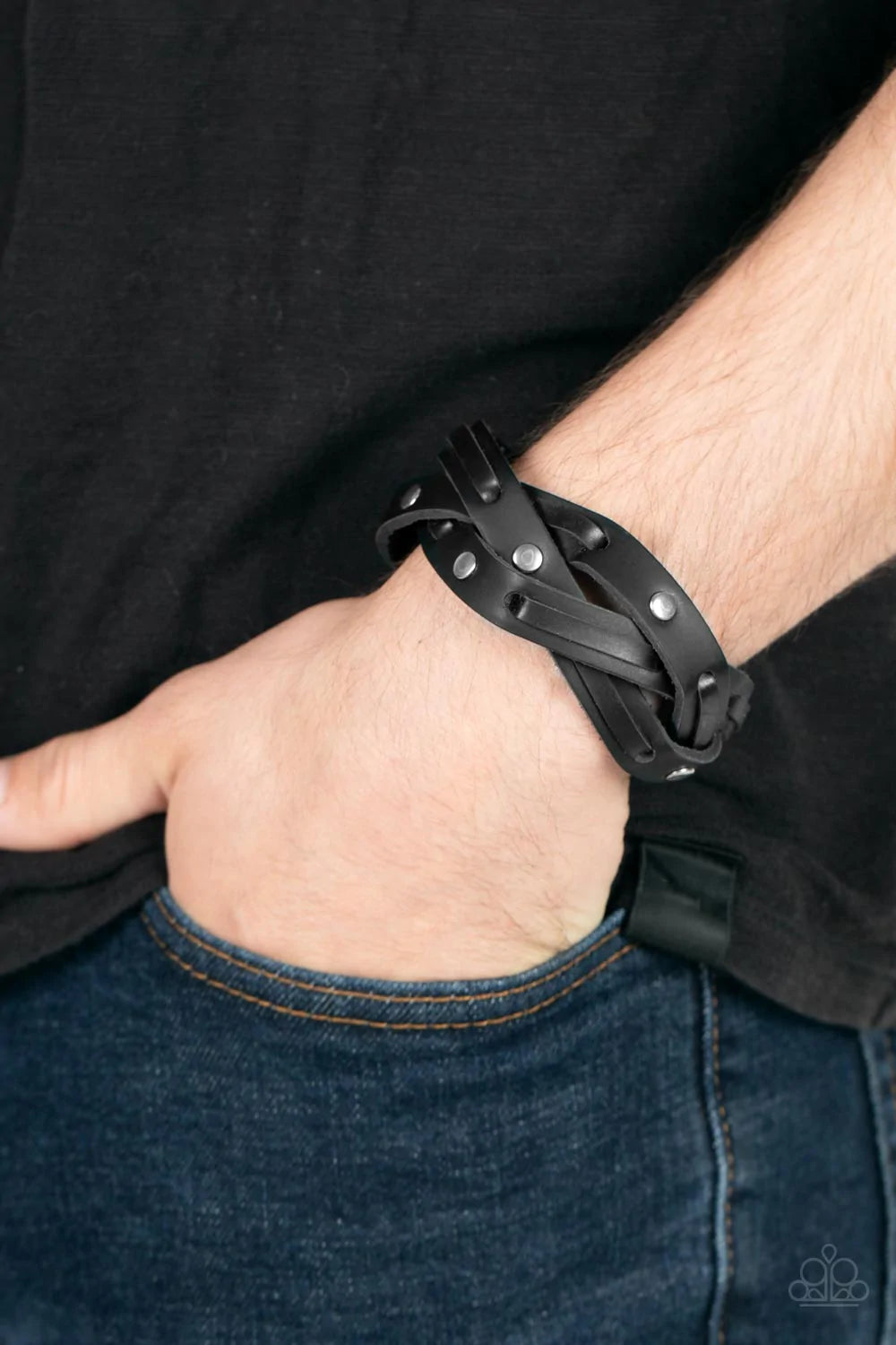 Paparazzi Accessories Rugged Roundup - Black Featuring sections of silver studs and black leather laces, black leather bands weave into a rugged braid around the wrist. Features an adjustable snap closure. Sold as one individual bracelet. Jewelry