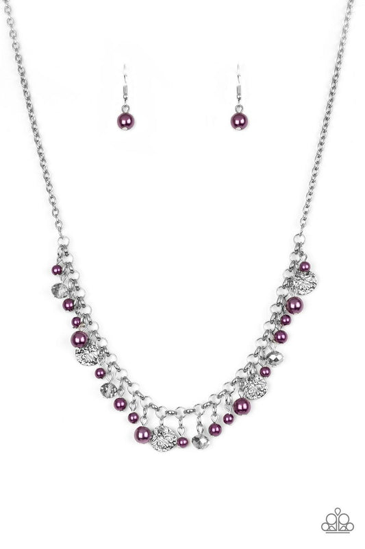 Paparazzi Accessories Coastal Cache - Purple Pearly purple beads, smoky crystal-like gems, and hammered silver discs swing from a bold silver chain, creating a refined fringe below the collar. Features an adjustable clasp closure. Sold as one individual n