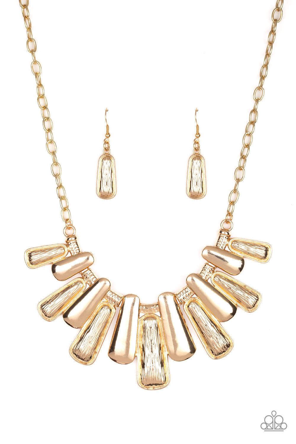 Paparazzi Accessories MANE Up - Gold Featuring smooth and etched finishes, a collection of glistening gold plates link below the collar, creating a blinding fringe. Features an adjustable clasp closure. Jewelry