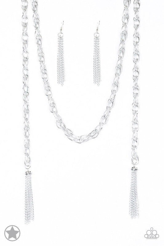 Paparazzi Accessories SCARFed for Attention - Silver A single strand of spiraling, interlocking links with light-catching texture is anchored by two tassels of chain that add dramatic length to the piece. Undeniably the most versatile piece in Paparazzi's