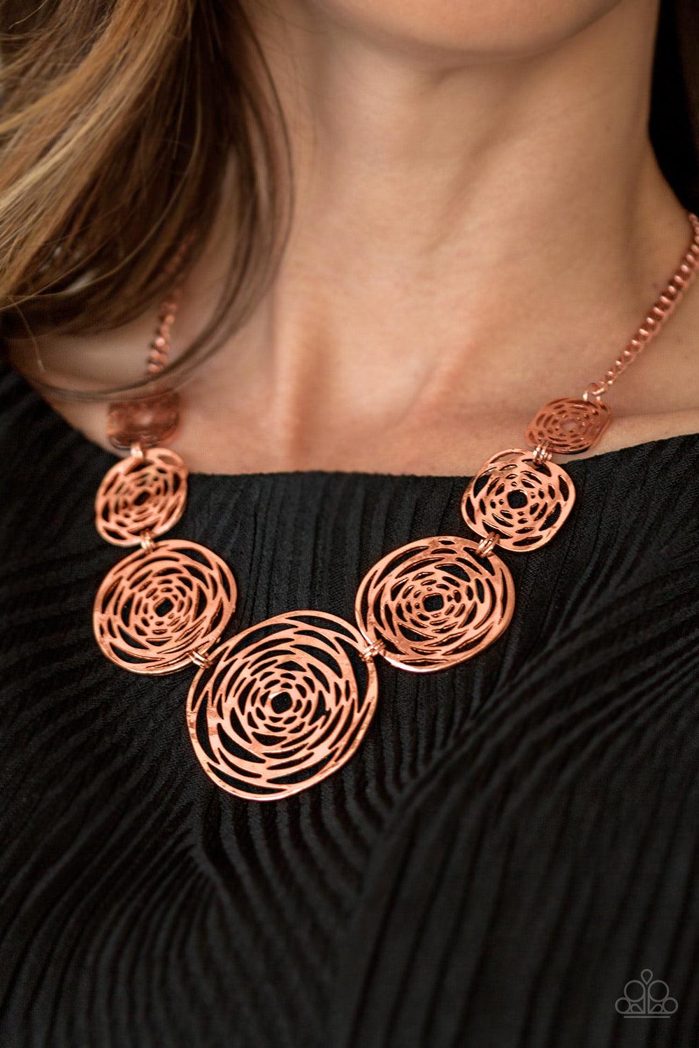 Paparazzi Accessories Cave Vogue ~Copper Delicately hammered in uneven surfaces, stenciled shiny copper frames link below the collar in a bold artisanal fashion. Features an adjustable clasp closure. Sold as one individual necklace. Includes one pair of m