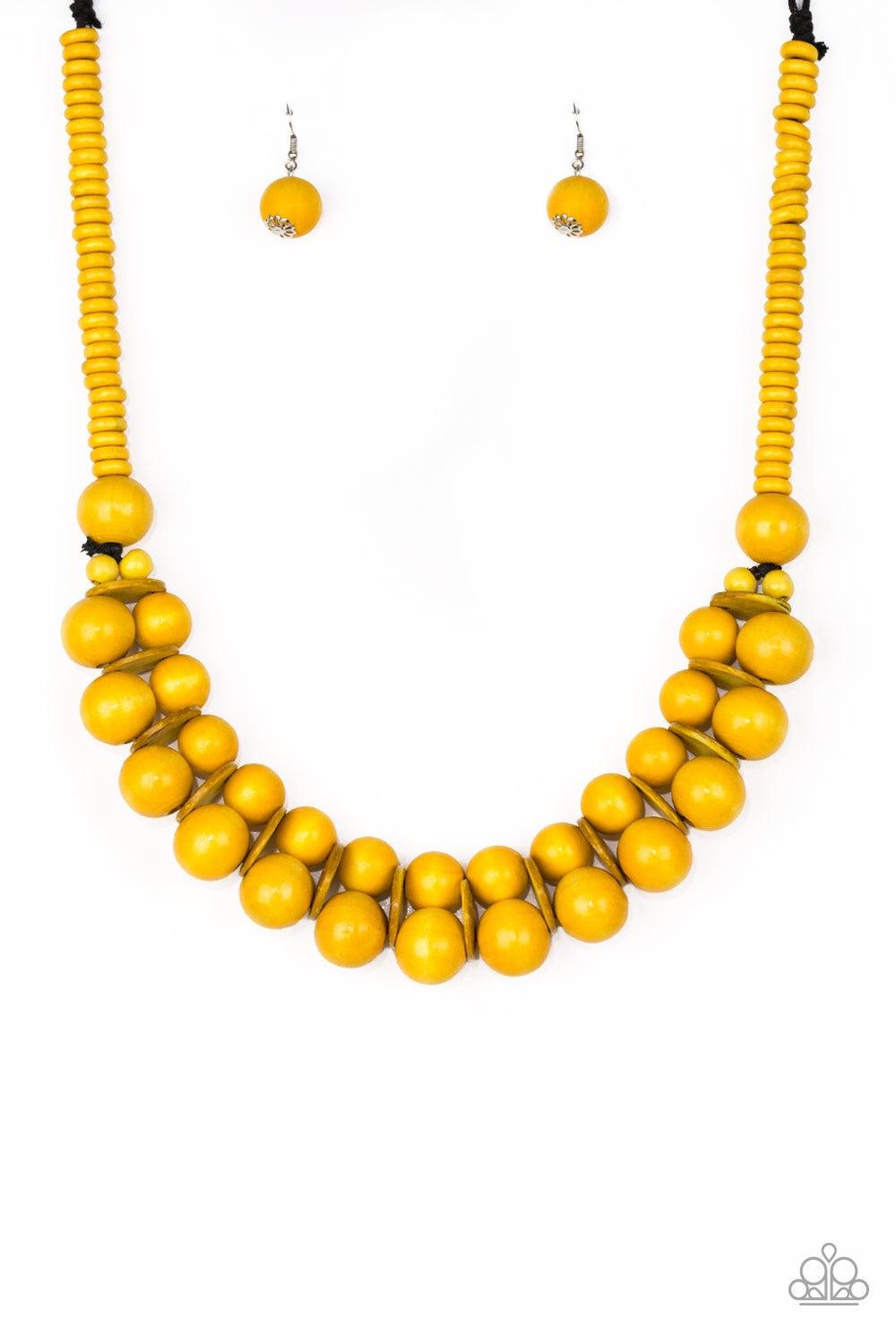 Paparazzi Accessories Caribbean Cover Girl - Yellow Brushed in a distressed finish, sunny yellow wooden beads and discs join below the collar for a summery look. Features a button loop closure. Jewelry