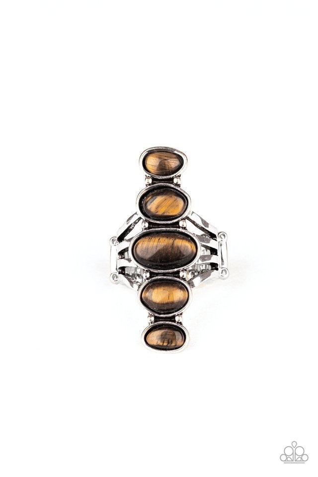 Paparazzi Accessories Stone Sublime - Brown Featuring imperfect silver frames, asymmetrical Tiger's Eye stones dramatically stack across the finger for an ethereal look. Features a stretchy band for a flexible fit. Sold as one individual ring. Jewelry