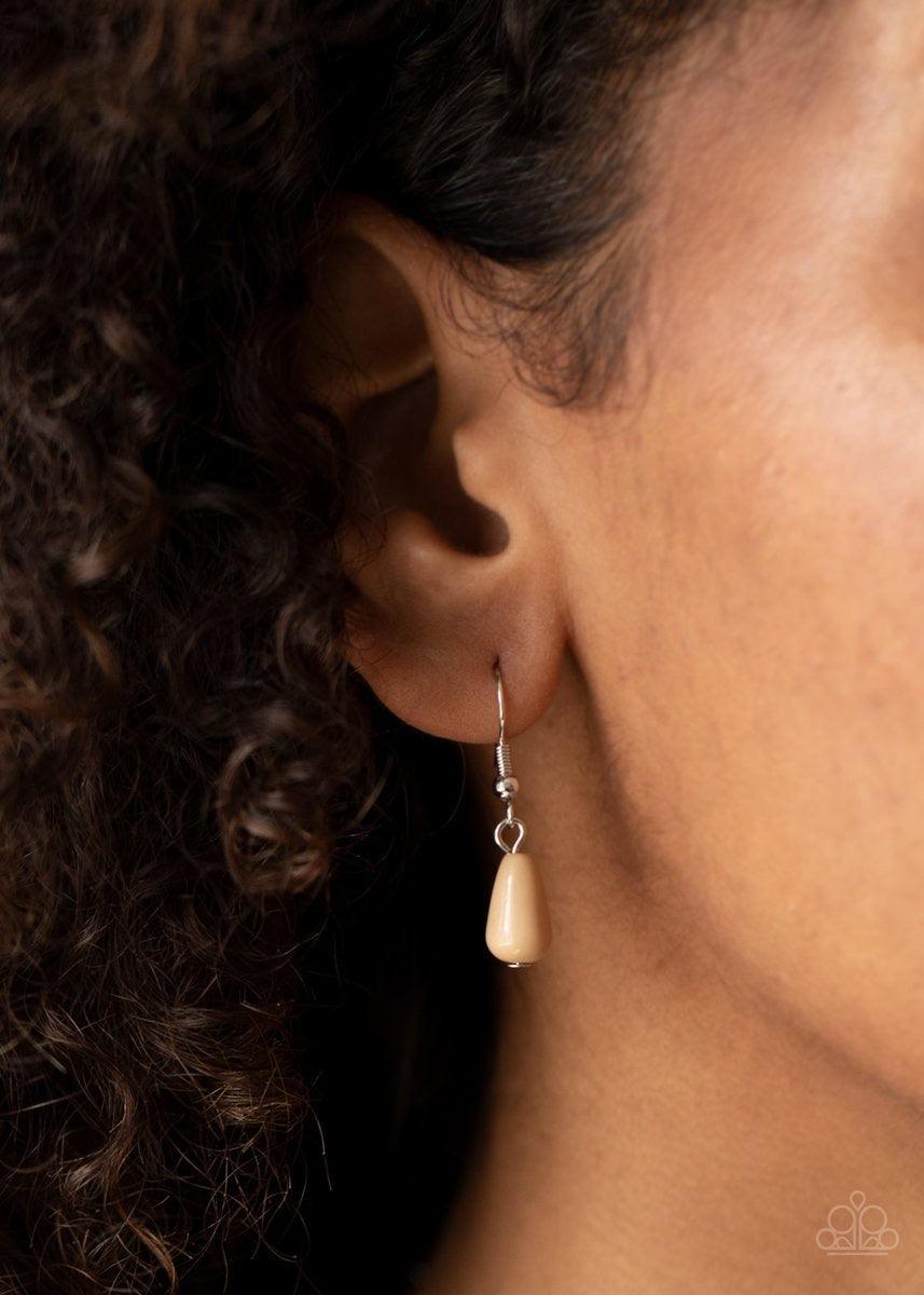 Paparazzi Accessories Bohemian Banquet - Brown Featuring round, teardrop, and oval shapes, a shiny collection of dainty Lark beads delicately link into bubbly silver frames, creating a whimsical pop of color below the collar. Features an adjustable clasp