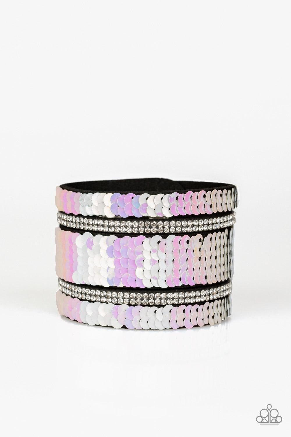 Paparazzi Accessories MERMAID Service - White Infused with strands of blinding white rhinestones, row after row of shimmery sequins are stitched across the front of a spliced black suede band. Bracelet features reversible sequins that change from white to
