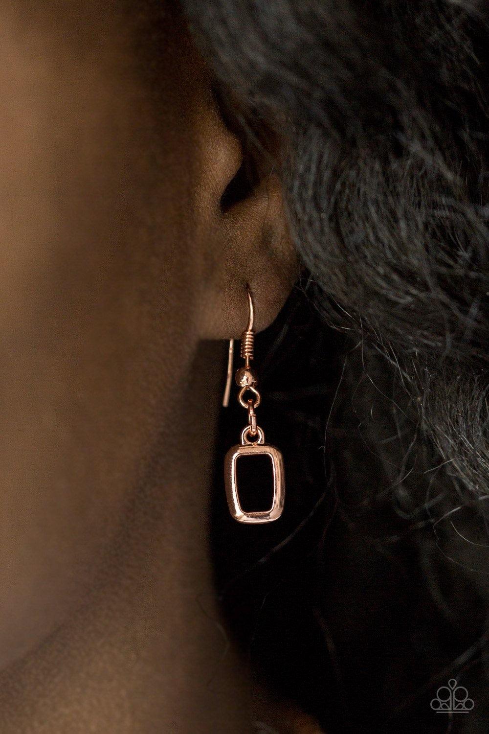 Paparazzi Accessories Gorgeously Geometric - Copper Swinging from the bottom of a shiny copper chain, asymmetrical rectangle frames link below the collar for an edgy geometric look. Features an adjustable clasp closure. Sold as one individual necklace. In