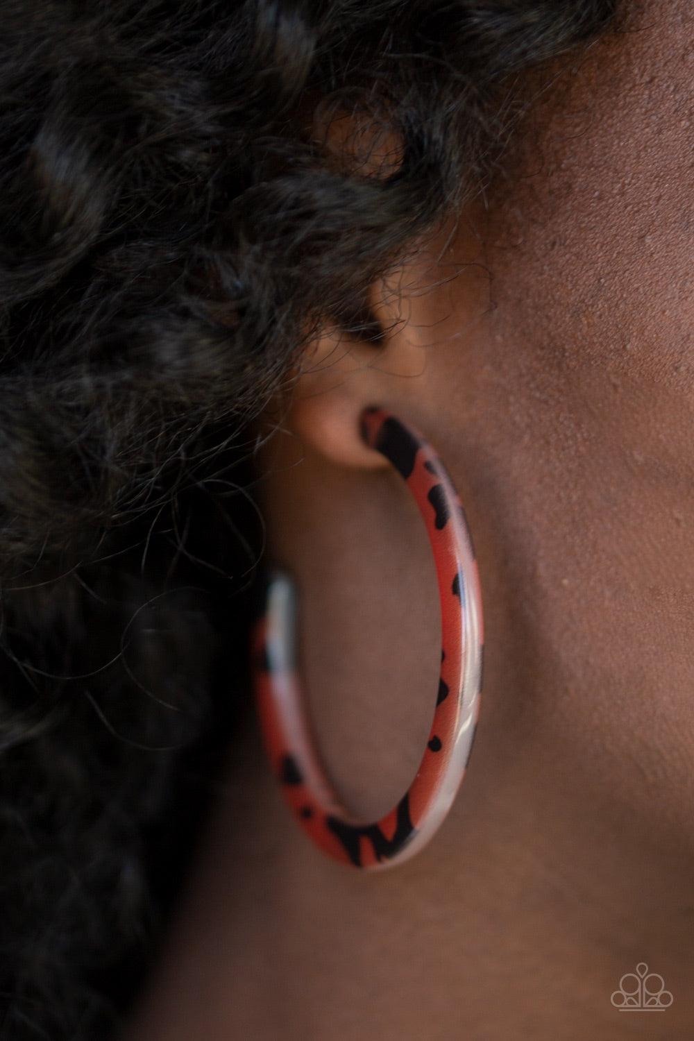 Paparazzi Accessories HAUTE-Blooded - Brown Featuring a tortoise-shell like pattern, a brown acrylic frame curls around the ear for a retro flair. Earring attaches to a standard post fitting. Hoop measures 2 1/2" in diameter. Jewelry
