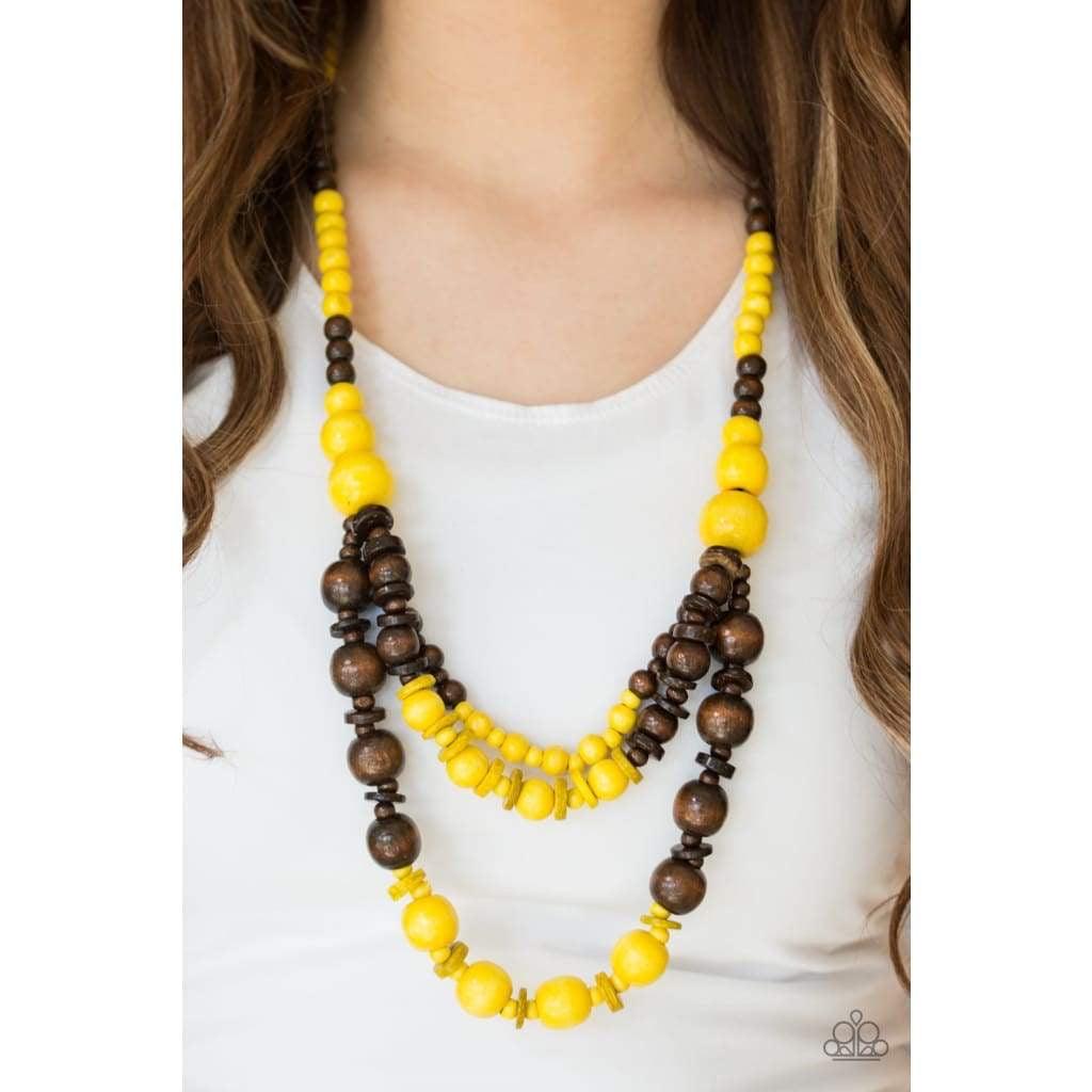 Paparazzi Accessories Rio Rainbows - Yellow Brushed in sunny yellow and earthy brown finishes, vivacious wooden beads and discs are threaded along strands of shiny brown cording for a summery look. Jewelry