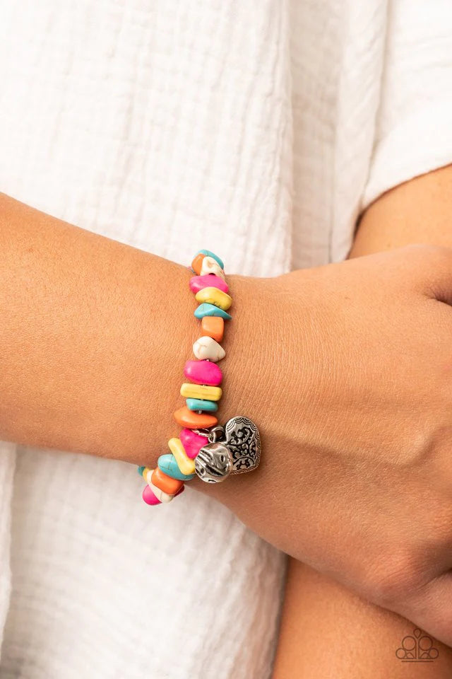 Paparazzi Accessories Love You To Pieces - Multi Infused with a hammered silver bead and a decorative silver heart charm, an earthy collection of multicolored pebbles are threaded along a stretchy band around the wrist for a whimsical fashion. Jewelry