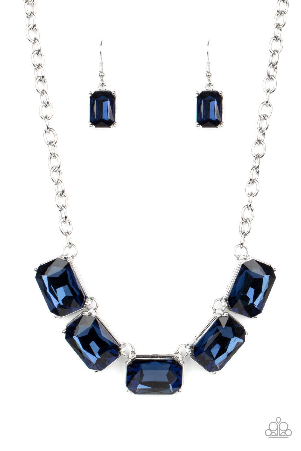 Paparazzi Accessories Deep Freeze Diva - Blue Featuring regal emerald style cuts, an oversized collection of blue rhinestones dramatically link below the collar for an icy finish. Features an adjustable clasp closure. Sold as one individual necklace. Incl
