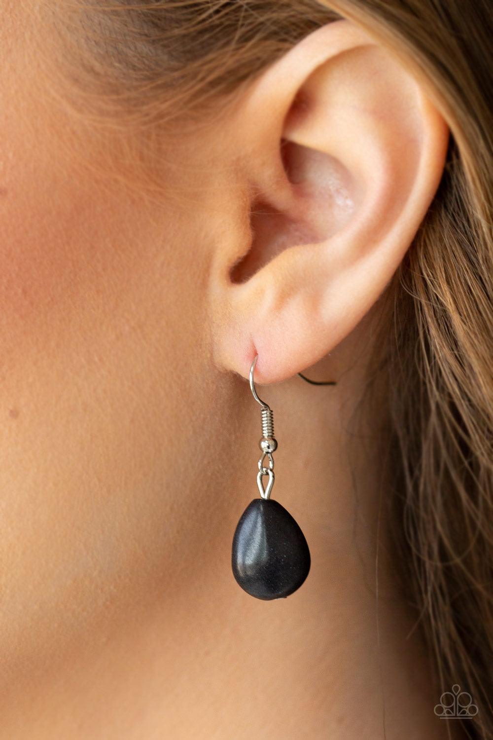 Paparazzi Accessories Prowling Prowess - Black Etched in linear textures, bowing silver bars link with an ornate silver plate dotted with an earthy black stone. Embossed in dizzying tribal inspired patterns, an oversized black stone dotted teardrop pendan