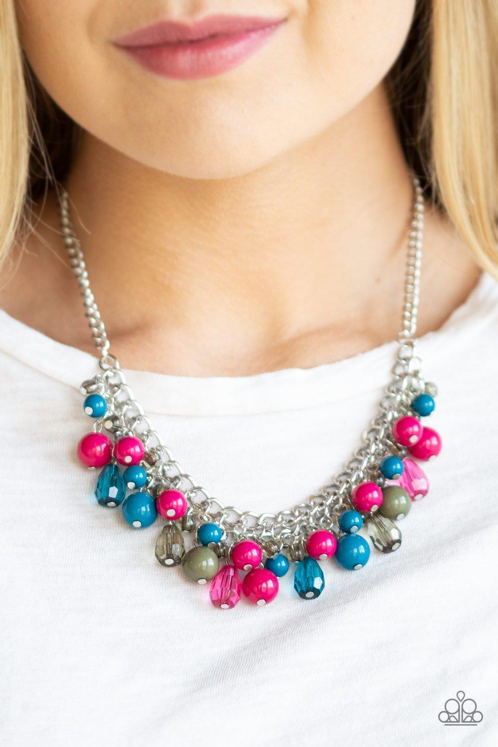 Paparazzi Accessories Tour de Trendsetter - Multi Varying in shape, glassy and polished blue, green, and pink beads swing from the bottom of interlocking silver chains. Crystal-like teardrops are sprinkled along the colorful beading, creating a flirtatiou