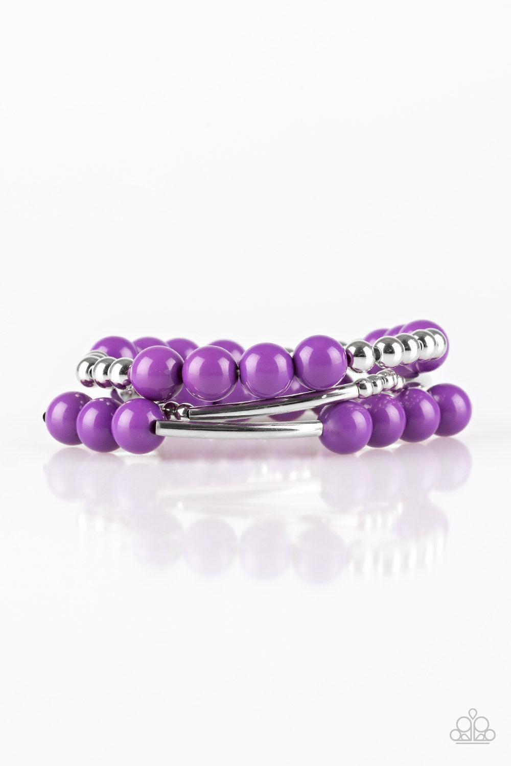 Paparazzi Accessories New Adventures - Purple Polished purple beads and mismatched silver beads are threaded along stretchy bands, creating colorful layers across the wrist. Jewelry