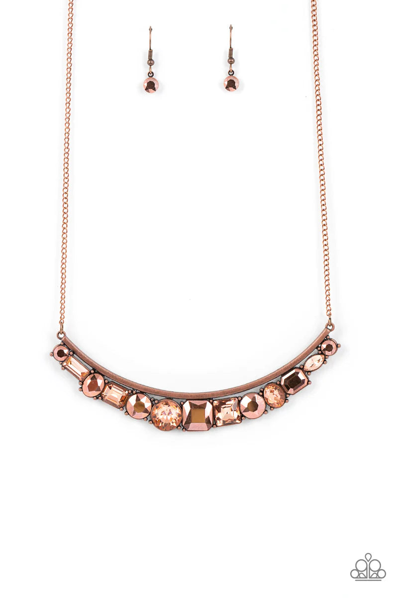 Paparazzi Accessories The Only SMOKE-SHOW in Town - Copper Featuring round, emerald, oval, and square cuts, a glitzy collection of copper aurum and coppery rhinestones alternates along the bottom of a curved copper rod. The sparkly compilation attaches to