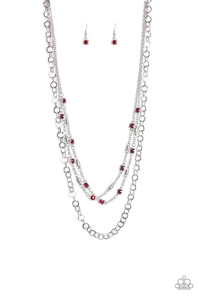 Paparazzi Accessories Metro Mixer - Red Dotted with glassy red rhinestones and glistening silver accents, a collision of mismatched silver chains layer down the chest for a refined flair. Features an adjustable clasp closure. Sold as one individual neckla