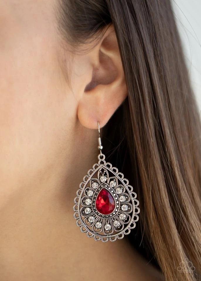 Paparazzi Accessories Eat, Drink, and BEAM Merry - Red White rhinestone dotted silver petals flare out from a red teardrop rhinestone center, coalescing into a frilly frame. Earring attaches to a standard fishhook fitting. Sold as one pair of earrings. Je
