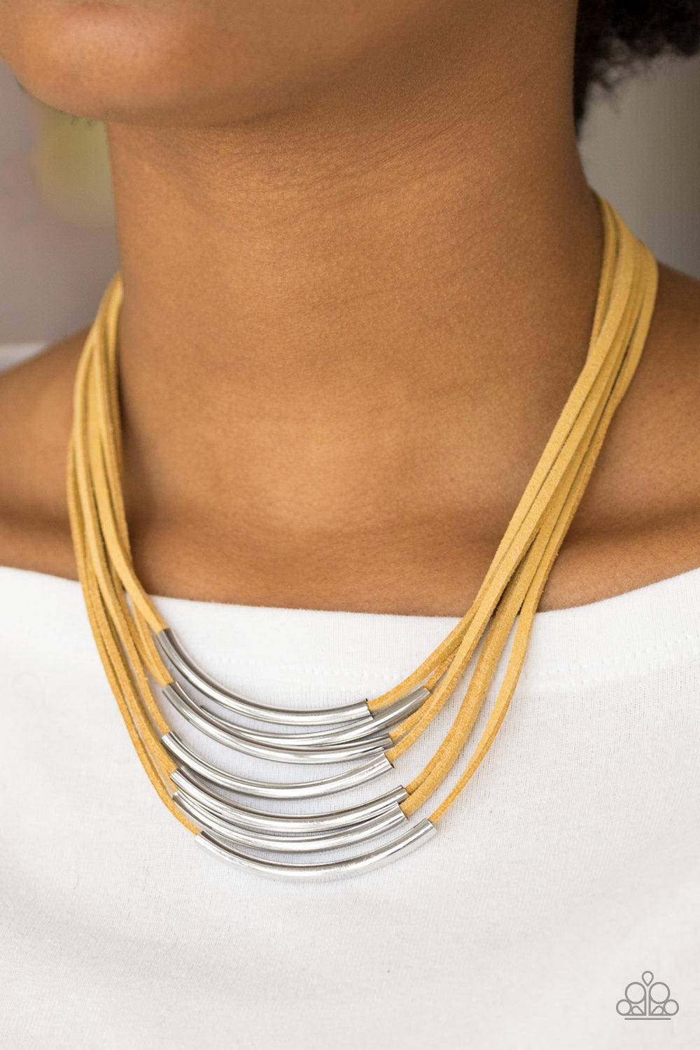 Paparazzi Accessories Walk The WALKABOUT ~Yellow Glistening silver rods slide along strips of rustic yellow suede, creating earthy layers below the collar. Features an adjustable clasp closure.
