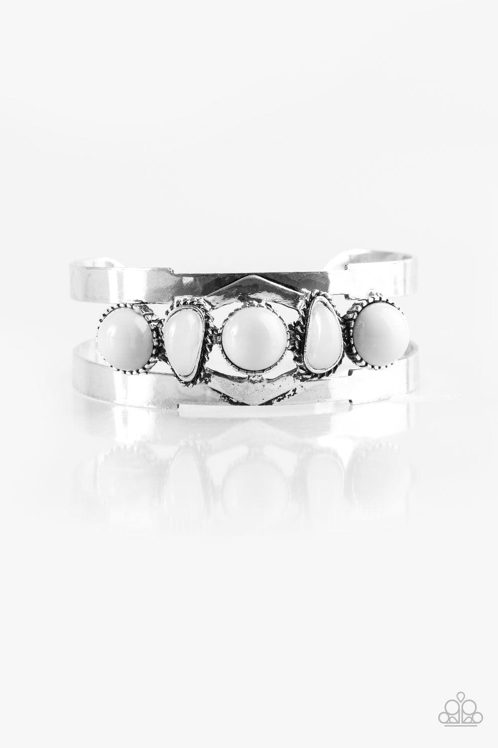 Paparazzi Accessories Keep On TRIBE-ing - Silver Featuring glassy and polished surfaces, shiny white and gray beads are pressed across the center of a silver cuff for a tribal inspired look. Sold as one individual bracelet. Jewelry
