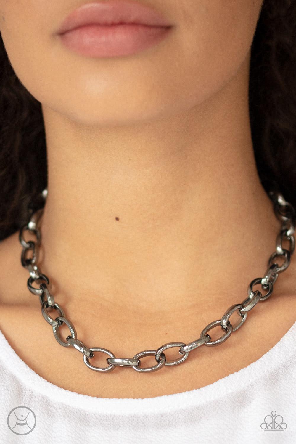 Paparazzi Accessories Urban UpLink - Black Oversized gunmetal links connect below the collar for a bold urban look. Features an adjustable clasp closure. Jewelry