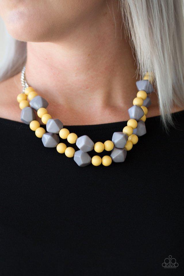 Paparazzi Accessories Galapagos Glam - Multi Tiers of round yellow and abstract gray beading layer below the collar in a colorful fashion. Features an adjustable clasp closure. Jewelry