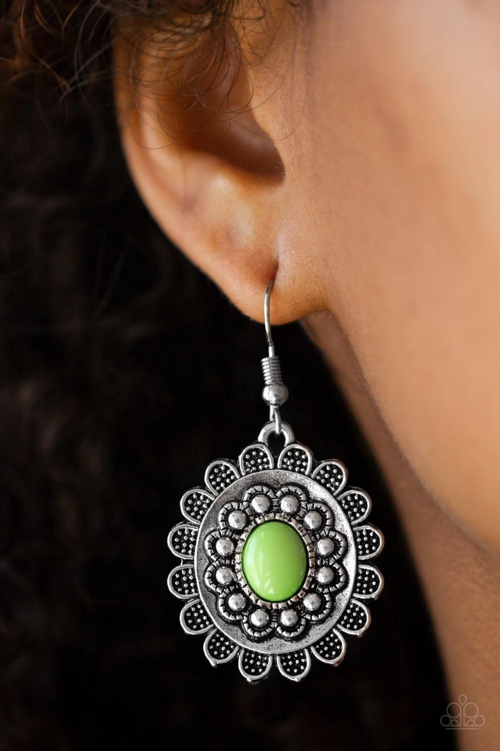 Paparazzi Accessories Summer Blooms - Green A refreshing green bead is pressed into the center of an ornate floral frame for a summery look. Earring attaches to a standard fishhook fitting. Jewelry