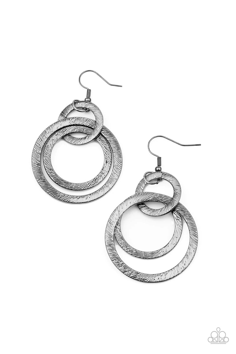 Paparazzi Accessories Distractingly Dizzy - Black Etched and embossed in shimmery textures, a trio of glistening gunmetal hoops interlock into a dizzying lure. Earring attaches to a standard fishhook fitting. Sold as one pair of earrings. Earrings