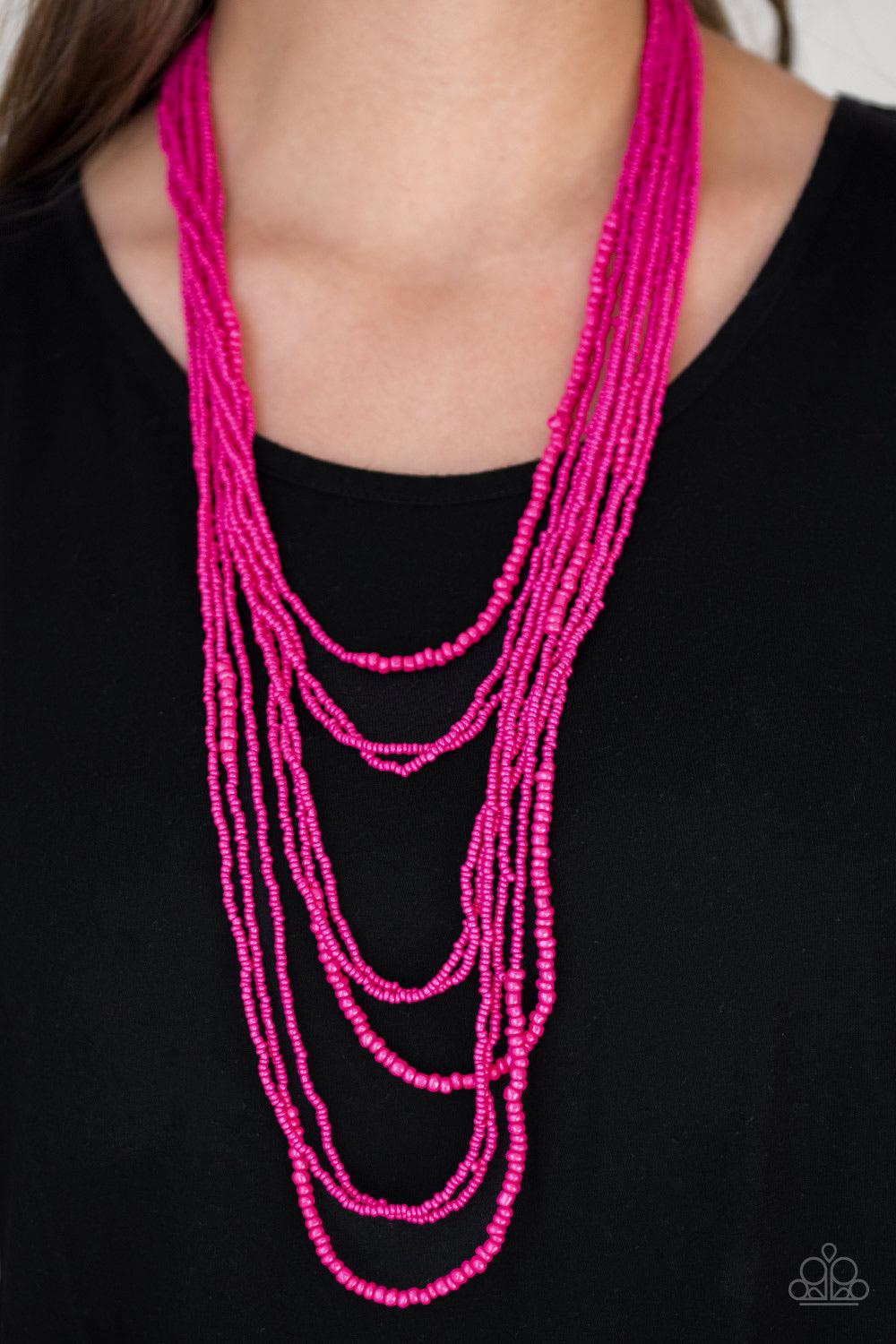 Paparazzi Accessories Totally Tonga - Pink Varying in size, row after row of shiny pink seed beads cascade down the chest, creating summery layers. Features an adjustable clasp closure. Jewelry