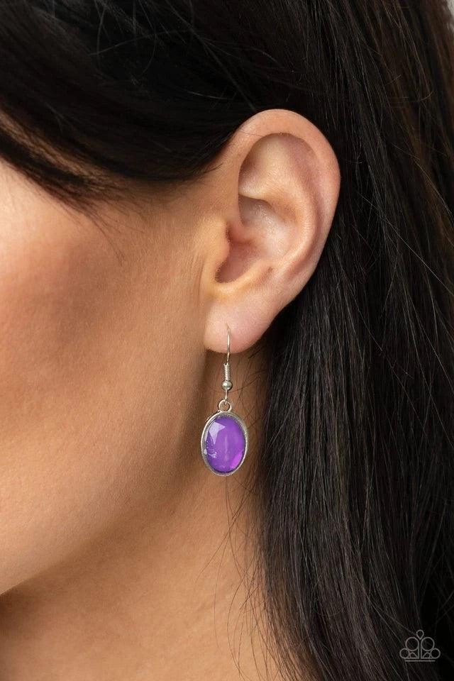 Paparazzi Accessories Serene Gleam - Purple A stunning array of oval cut Amethyst Orchid gems, pressed into silver frames, interconnect into a spectacular princess-like bib design. The display rests just below the collar for an exquisitely serene gleam. F