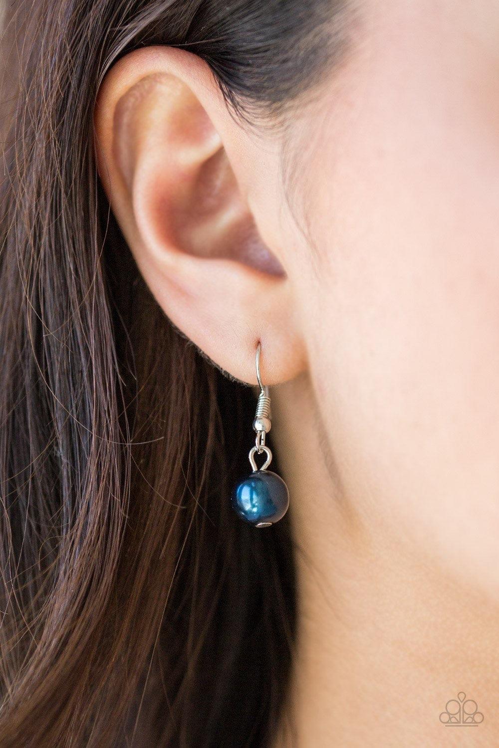 Paparazzi Accessories Classical Cadence - Blue Wrapped in wire mesh, classic silver beads join pearly blue beads along a shimmery silver chain. Varying in size and shimmer, mismatched silver chains layer behind the beaded strand for a refined finish. Feat
