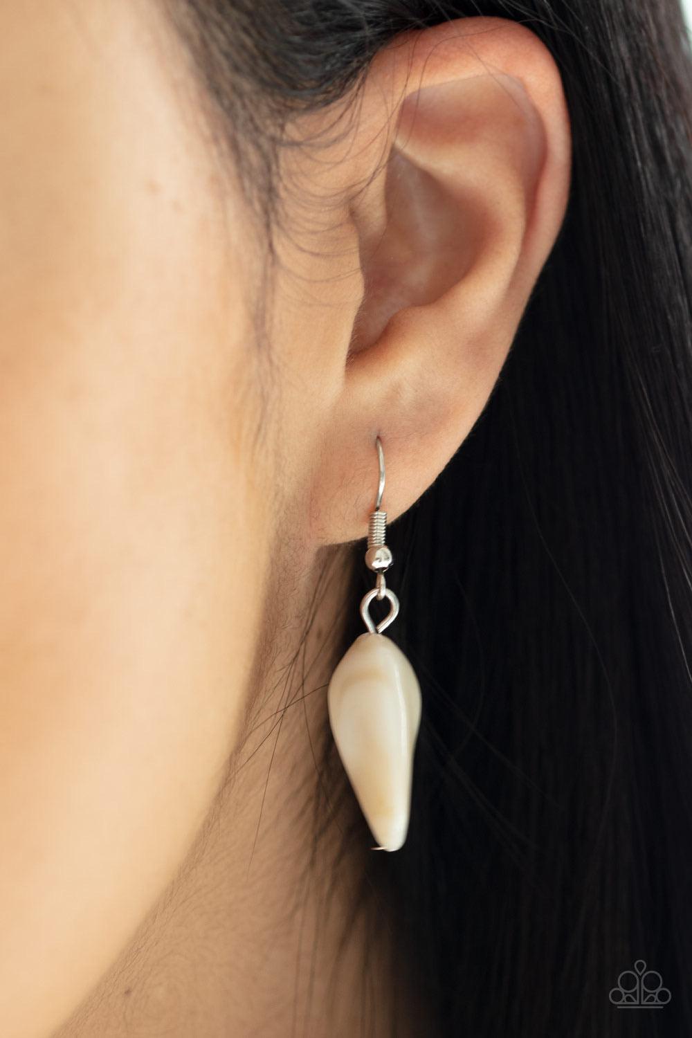 Paparazzi Accessories Seacoast Sunset - Blue A whimsical collection of silver, opaque crystal-like, cloudy white, and faceted blue beads are threaded along invisible wires, creating statement-making layers below the collar. Features an adjustable clasp cl
